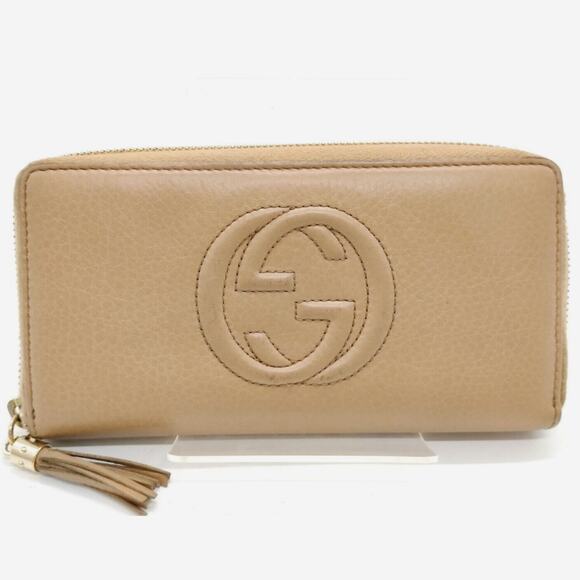 Gucci Handbags - Gucci Beige Pebbled Leather Full-Sized Zip Around Wallet